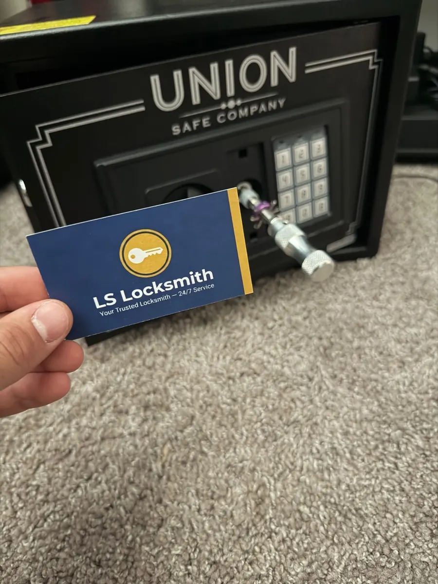 Safe and LS Locksmith business card at a safe service visit
