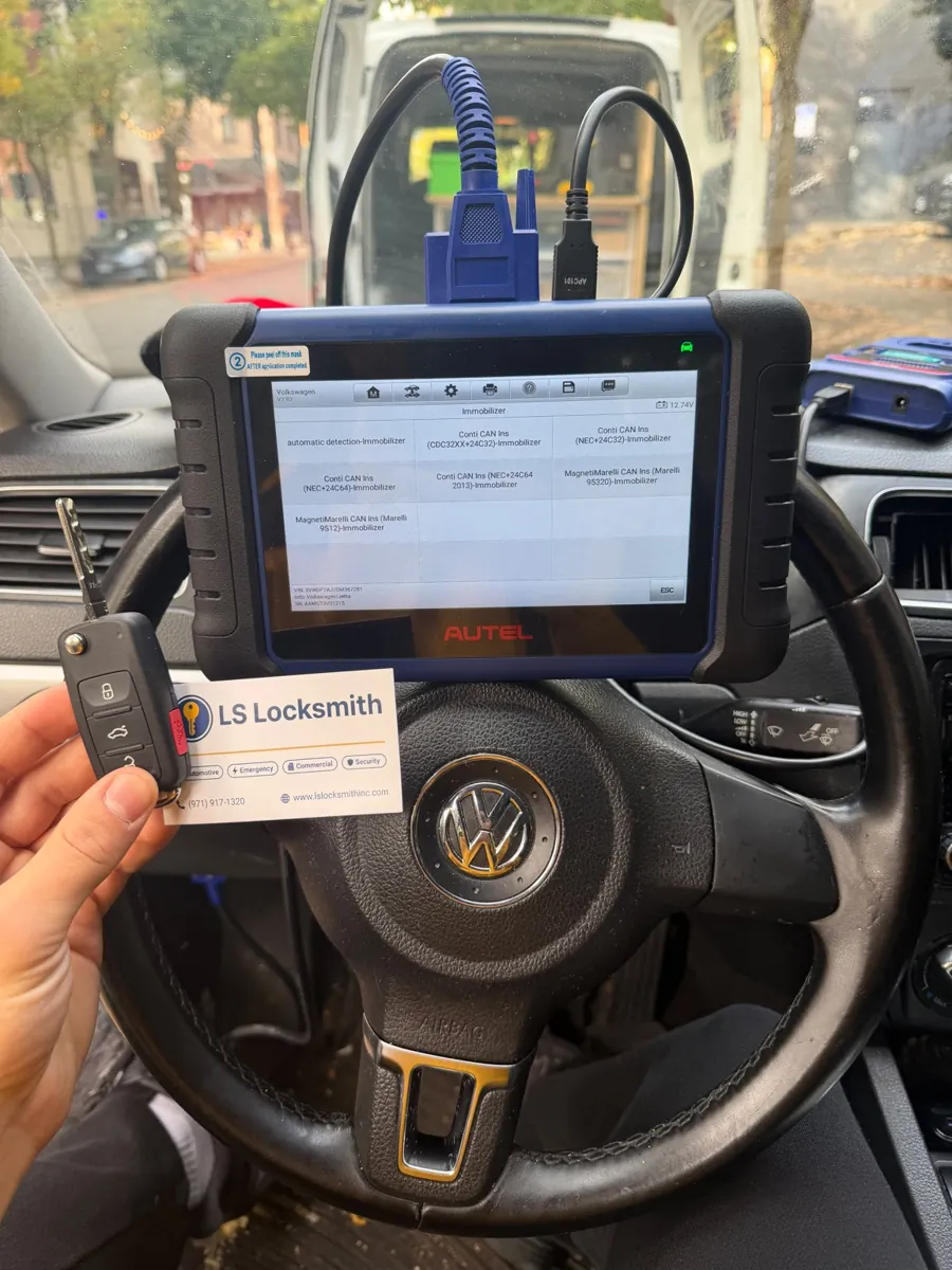 Key programming equipment connected inside a Volkswagen vehicle